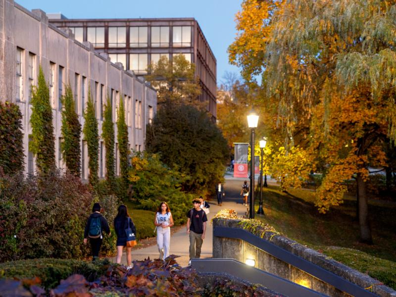 Students talking together outside on campus