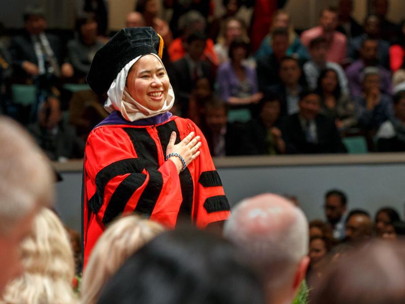 Graduates receive their diplomas at the 2016 Law School (LAW) Convocation.
